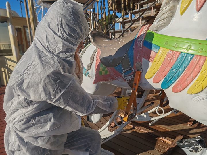 Sanding the details of a horse